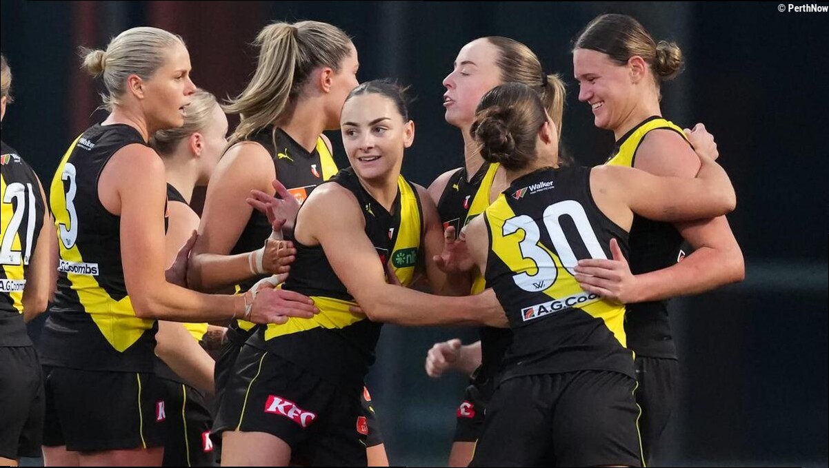Tigers celebrate old and new with AFLW win over Magpies