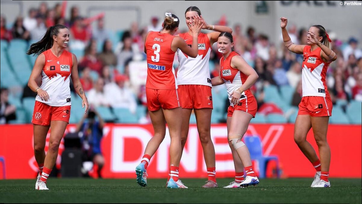 Swans AFLW team ride record support for Bombers win